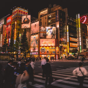 Bustling street scene in Tokyo, Japan — a top destination for business class flights from Los Angeles.