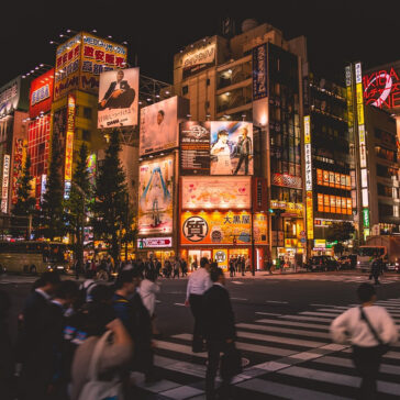 Bustling street scene in Tokyo, Japan — a top destination for business class flights from Los Angeles.